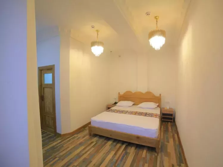 Voorbeeld kamer van Rizo Boutique Hotel in Boechara