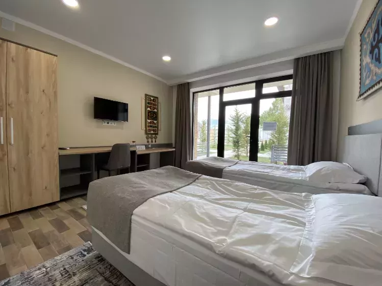 Voorbeeld kamer van Nomad Lodge Hotel in Kochkor