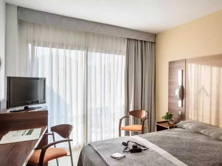 Voorbeeld kamer van Hotel Aquamarina in Santa Susanna