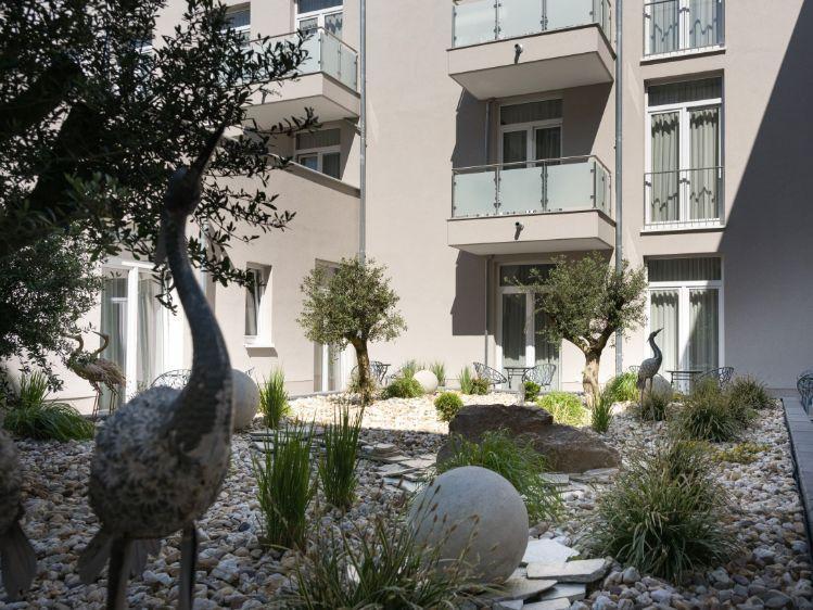 Atrium Apart Hotel Brühl - binnentuin